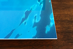 Photograph of the edge of a metal print